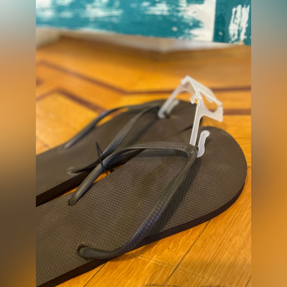 BNWT Brown flip flops size 11/12